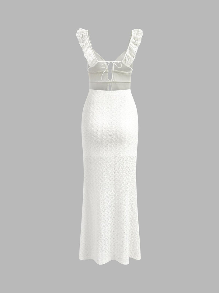 Langes Kleid mit Perlenbesatz und Schlüssellochausschnitt